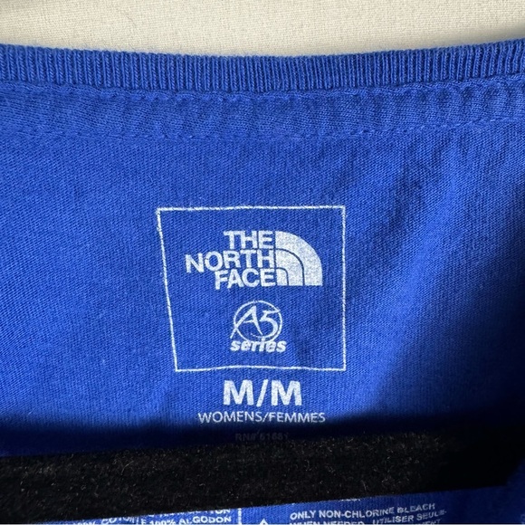 The North Face Blue Short Sleeve T-Shirt with Yellow Star Design Womens Size M - Picture 3 of 4